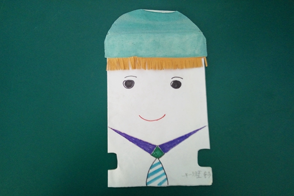 桓仁县木盂子小学王玪手工贴画小男孩